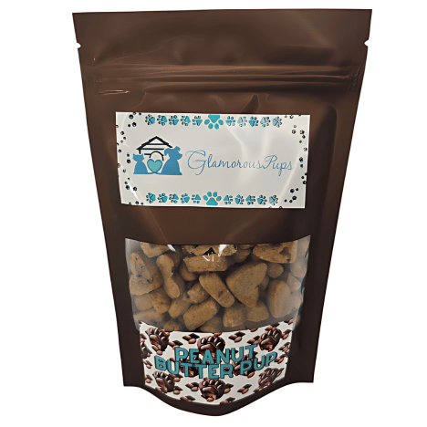 8oz bag of Peanut Butter Pup Dog Treats by Glamorous Pups, designed with an elegant brown resealable packaging, featuring a clear viewing section that displays uniquely shaped dog treats and adorned with a light blue and white logo banner.