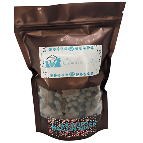 lb bag of Savory Bacon Bliss Dog Treats by Glamorous Pups, showcasing a clear view window with bacon-shaped treats inside, branded with the distinctive Glamorous Pups logo and design, emphasizing premium dog treats with a delicious bacon flavor.