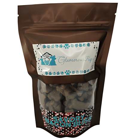 8oz bag of Savory Bacon Bliss Dog Treats by Glamorous Pups, featuring a semi-transparent packaging design that highlights the bacon-flavored treats, accented with a stylish blue and white label from Glamorous Pups, ideal for dog owners looking for high-quality, savory treats.