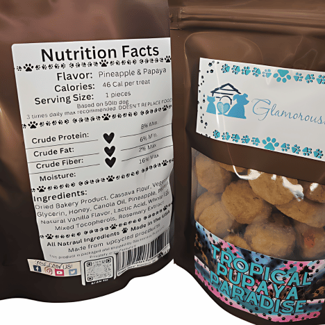 Nutrition facts label for Tropical Pupaya Paradise Dog Treats by Glamorous Pups. These premium treats are flavored with pineapple and papaya, providing a nutritious snack for your furry friend. Each piece contains essential nutrients to support overall health, making it a perfect choice for dog owners seeking quality and taste.