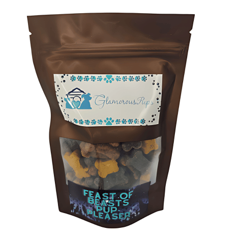 8oz bag of Feast of Beasts Pup-Pleaser Dog Treats by Glamorous Pups, featuring a semi-transparent packaging design. The bag showcases an array of bone-shaped dog treats visible through a clear window, designed to attract dog owners looking for premium, nutritious snacks for their pets.