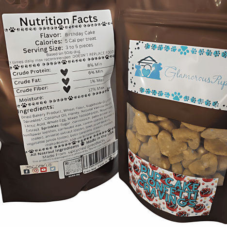 Nutrition Facts label for Pup Cake Confetti Cravings Dog Treats by Glamorous Pups, detailing 'Birthday Cake' flavor with 5 calories per treat. Ingredients include dried bakery product, honey, and sprinkles. The package, showing heart-shaped treats through a transparent window, features the Glamorous Pups logo and emphasizes these fun, gourmet treats made in the USA.