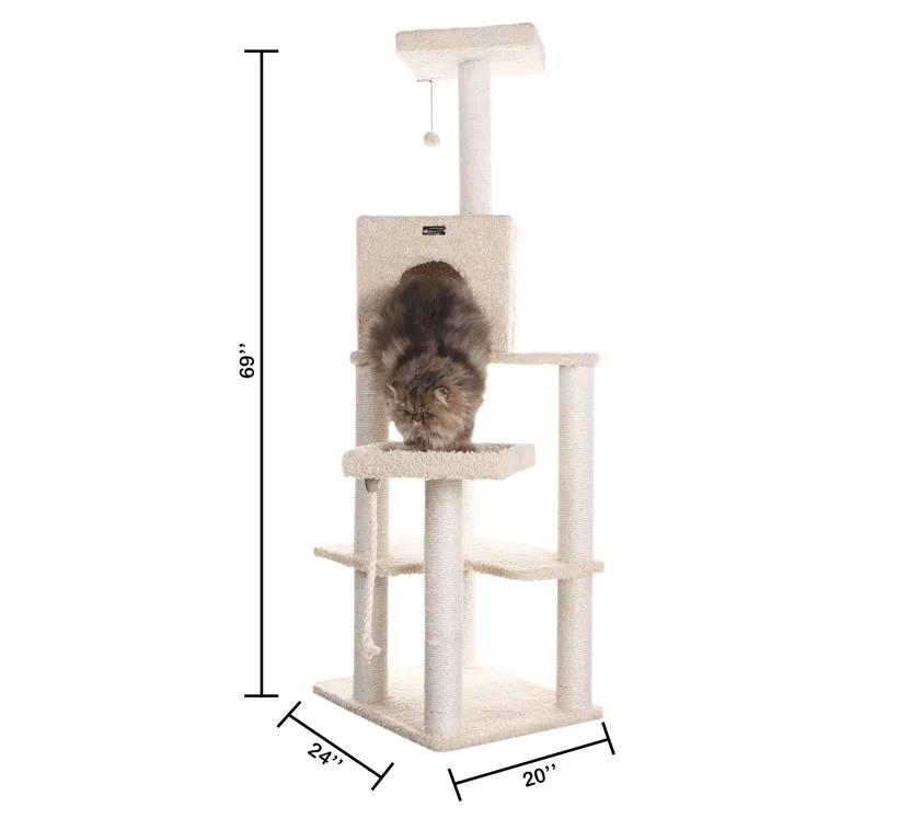 Armarkat Cat Tower 69" Real Wood Cat Condo House offers multi-level platforms, durable sisal-wrapped scratching posts, and a plush, soft ivory covering. Designed for cats to climb, scratch, and lounge, this sturdy structure includes a cozy enclosed condo and a top perch for feline relaxation. Ideal for active cats, it measures 24" x 20" at the base and stands 69" tall, providing ample space for play and rest. Available at Glamorous Pups.