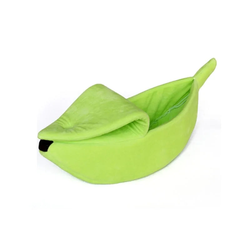 Cozy and fun Banana Cat Bed in vibrant green from our vendor Zendrop, available at Glamorous Pups. This unique cat bed features a peelable top, providing a snug and playful hideaway for your feline friend. Perfect for adding a whimsical touch to your pet's lounging area.